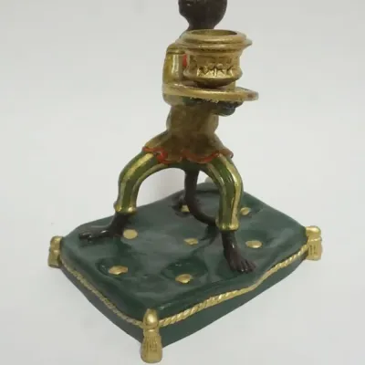 Sale Photo Thumbnail #33: 1033	CAST METAL HAND PAINTED MONKEY ON PILLOW CANDLESTICK, APPROXIMATELY 6 IN X 5 IN X 8 IN HIGH																																																																																																																																																															