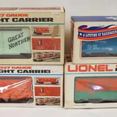 Sale Photo Thumbnail #157: 1157	LIONEL TRAINS 4 TRAIN FREIGHT CARS																																																																																																																																																																																																																								