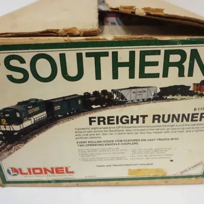 Sale Photo Thumbnail #153: 1153	LIONEL TRAINS SOUTHERN FREIGHT RUNNER NO 6-11704 TRAIN SET, SOUTHERN GP-9 LOCOMOTIVE & CARS																																																																																																																																																															