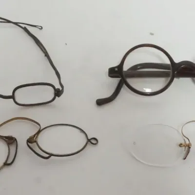 Sale Photo Thumbnail #127: 1127	GROUP OF ANTIQUE EYE GLASSES																																																																																																																																																																																																																														
