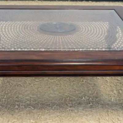 Sale Photo Thumbnail #195: 1194	LANE GLASS TOP COCKTAIL TABLE W/WOVEN CANE UNDER GLASS, APPROXIMATELY 49 IN X 36 IN X 19 IN HIGH																																																																																																																																																										