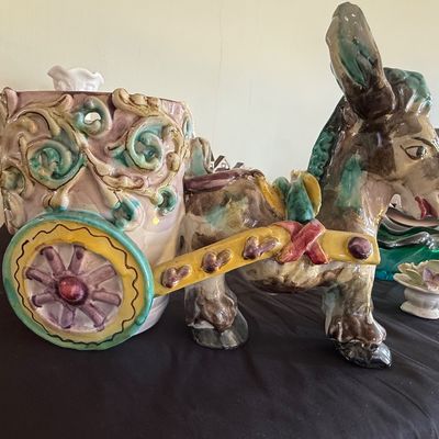 Sale Photo Thumbnail #60: Vintage Italian ceramic donkey and cart planter featuring ornate scrollwork and vibrant hand-painted glazes.