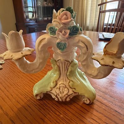 Sale Photo Thumbnail #26: Vintage Capodimonte-style porcelain multi-arm candelabra with applied pink roses and gilded trim, showing damage to one candle socket.