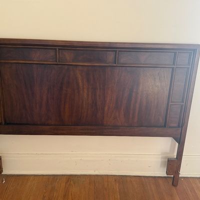 Sale Photo Thumbnail #6: Vintage dark wood headboard featuring raised rectangular panel trim detailing.