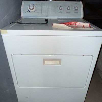 Sale Photo Thumbnail #12: Vintage white Whirlpool electric clothes dryer, showing some age and wear.