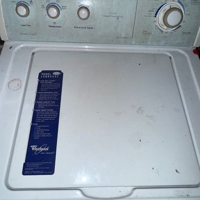 Sale Photo Thumbnail #14: Whirlpool Ultimate Care II top-load washing machine, model LSQ8543J, featuring 8 cycles and 5 speed combinations.