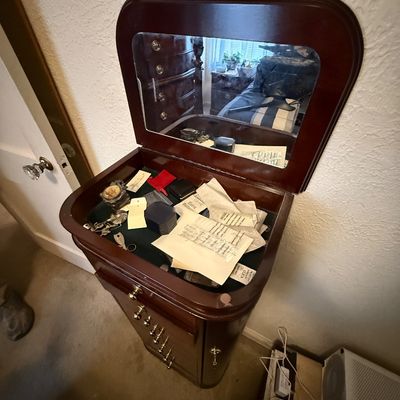 Mahogany Standing Jewelry Armoire with a Flip-top Mirror and Drawers, Filled with Assorted Jewelry and Paperwork
