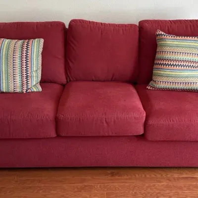 Sofabed in Dark Red with Throw Pillows 80” x 41” x 34”, 80” L Bed