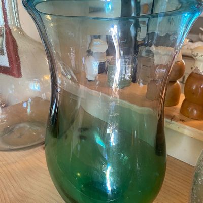 Sale Photo Thumbnail #98: Hand-blown Murano glass vase featuring an ombre gradient transition from dark green at the base to light teal blue at the flared rim.