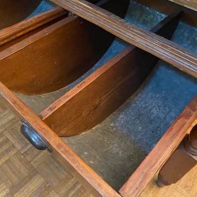 Sale Photo Thumbnail #25: Antique wooden baker's cabinet or store counter featuring curved tilt-out flour bins lined with galvanized metal.