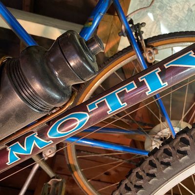 Sale Photo Thumbnail #115: Vintage Motobecane bicycle frame detail with attached water bottle and cage.