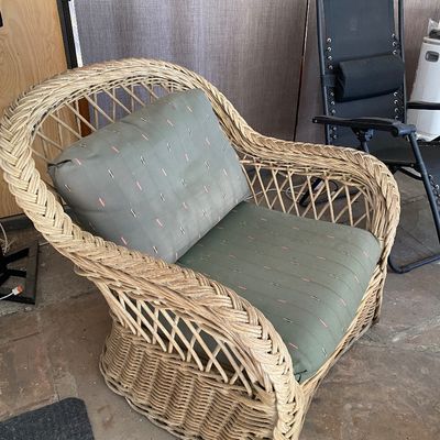 Sale Photo Thumbnail #57: Natural wicker lounge chair featuring braided trim detailing and green fabric seat cushions.