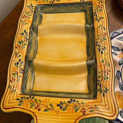Sale Photo Thumbnail #181: Hand-painted Italian ceramic three-section serving platter featuring a Tuscan olive branch border in warm yellow, green, and navy tones.