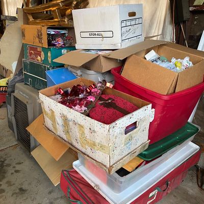 Sale Photo Thumbnail #117: Assorted storage containers, cardboard boxes, and plastic totes filled with holiday decorations, craft supplies, and household goods.