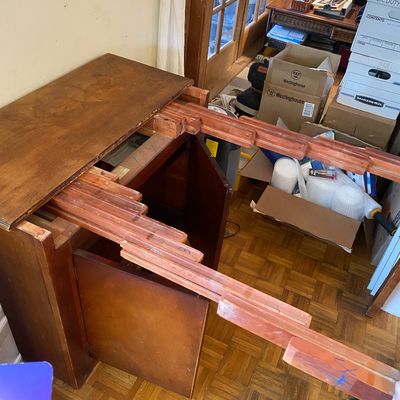 Sale Photo Thumbnail #191: Vintage expanding wooden dining table base or sideboard with fully extended slide mechanism.