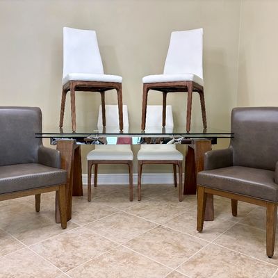 Somette extendable modern dining table with 6 chairs. Measurements: L - 63" / W - 35.25" / H - 30". Each leaf adds an...