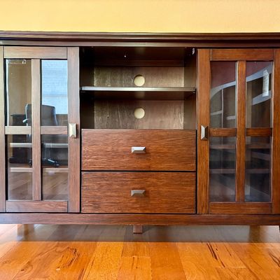 Entertainment console with cabinet and shelf storage. Measurements: W - 53" / D - 16.5" / H - 35" 