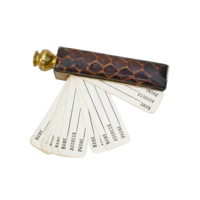 Sale Photo Thumbnail #269: VINTAGE MINIATURE LEATHER AND BRASS ADDRESS BOOK