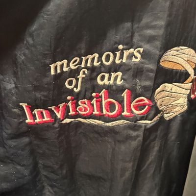 Sale Photo Thumbnail #34: Vintage black crew jacket with embroidered promo logo for the 1992 film 'Memoirs of an Invisible Man'.