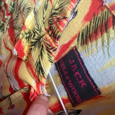 Sale Photo Thumbnail #37: Vintage Jack Hollywood Hawaiian shirt with a colorful palm tree graphic print.