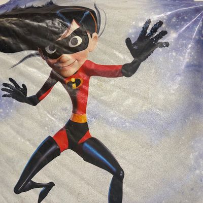 Sale Photo Thumbnail #40: Disney Pixar *The Incredibles* printed banner featuring Violet Parr against a starry background.