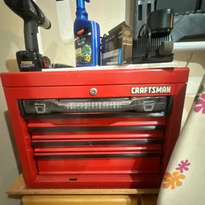 Red Craftsman multi-drawer portable tool chest.