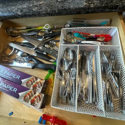 Cutlery and assortment of utensils.