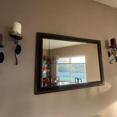 Large dark wood framed wall mirror