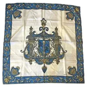 Vintage silk scarf featuring a coat-of-arms crest design in blue and gold on an ivory background.