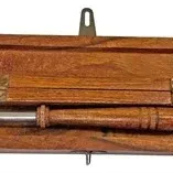 Vintage turned wood dip pen with a metal nib, presented inside a matching carved wooden hinged storage box.