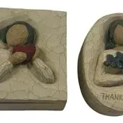 Two Willow Tree resin keepsake boxes, including one square box with a figure holding a heart and an oval box inscribed 'THANK...