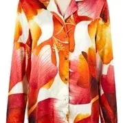Vibrant long-sleeve silk or satin button-up shirt featuring an oversized floral hibiscus print in shades of red, orange, and white.