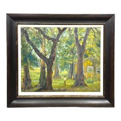 Sale Photo Thumbnail #90: Impressionist-style oil landscape painting depicting large trees and a small cabin, presented in a heavy dark wooden frame with white trim.