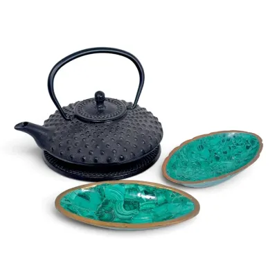 Sale Photo Thumbnail #226: Japanese cast iron hobnail teapot with trivet, accompanied by two oval brass trinket dishes with malachite inlay.
