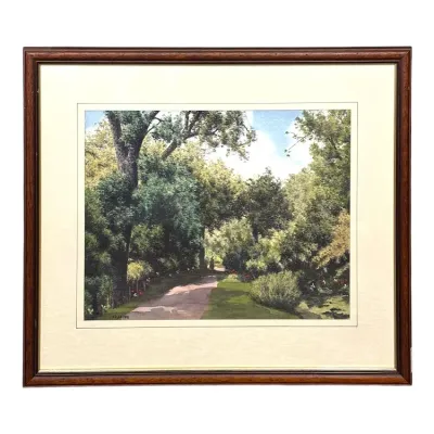 Sale Photo Thumbnail #93: Framed landscape art print depicting a wooded garden path, signed Kelly 1991, housed in a matted dark wood frame.