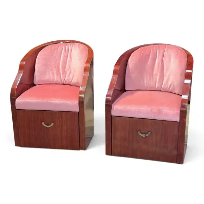 Sale Photo Thumbnail #134: Pair of Art Deco style wood club chairs featuring high-gloss mahogany veneer bases with built-in storage drawers and plush pink velvet upholstery.