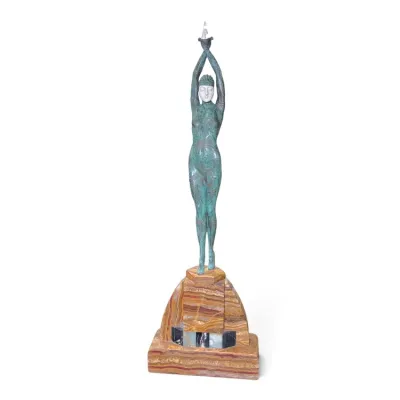Sale Photo Thumbnail #158: Art Deco style chryselephantine bronze and ivory-style figure after Demetre Chiparus, depicting a dancer in a patterned suit mounted on a tiered onyx and marble base.