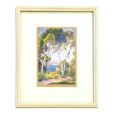 Sale Photo Thumbnail #43: Framed impressionist landscape print depicting a coastal scene with eucalyptus trees, presented in an off-white wooden frame with wide matting.