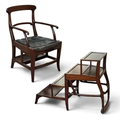 Sale Photo Thumbnail #138: Vintage dark wood metamorphic library chair that converts into a set of four steps, featuring a tufted black leather seat cushion.