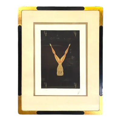 Sale Photo Thumbnail #84: Framed Art Deco limited edition serigraph print by Romain de Tirtoff (Erté) depicting the letter "Y" from the Alphabet Series, housed in a black and gold frame.