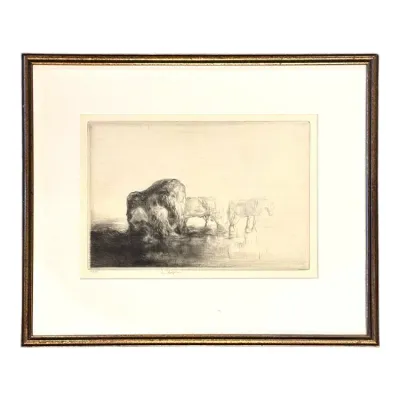 Sale Photo Thumbnail #99: Framed antique etching depicting workhorses in a field, housed under glass in a dark wood frame with gilt accent trim.