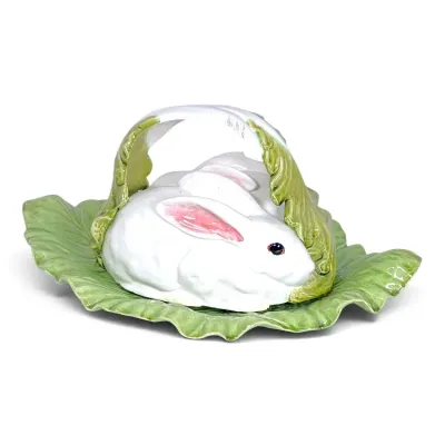 Sale Photo Thumbnail #227: Vintage ceramic rabbit covered dish featuring white bunnies resting inside a green cabbage leaf basket.