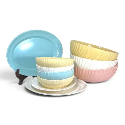 Sale Photo Thumbnail #206: Collection of mid-century pastel ceramic dinnerware featuring swirl-rim bowls, plates, and a blue oval platter.