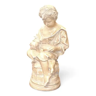 Sale Photo Thumbnail #193: Cast stone or plaster garden statue of a seated boy holding a bird, featuring a weathered antique finish.