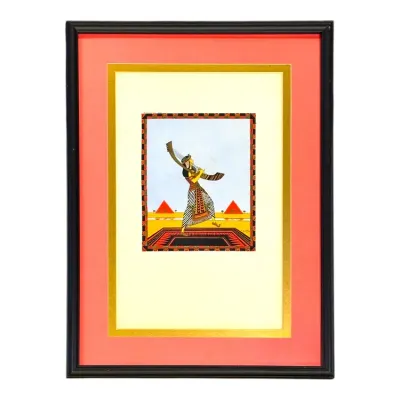 Sale Photo Thumbnail #37: Framed Egyptian Revival art print featuring a figure playing a harp against a background of pyramids, double-matted in gold and coral with a black frame.