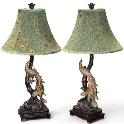 Sale Photo Thumbnail #180: Pair of Hollywood Regency style peacock table lamps featuring sculpted bronze-tone resin bases and matching green peacock feather motif bell shades.