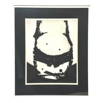 Sale Photo Thumbnail #94: Framed mid-century abstract expressionist print featuring bold black and white linework, housed in a thin silver frame with a dark mat.