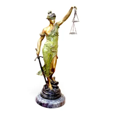 Sale Photo Thumbnail #202: Bronze Lady Justice statue with patinated green drapery, sword, scales, and a marble base.