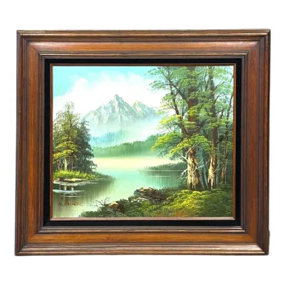 Sale Photo Thumbnail #117: Framed oil painting on canvas depicting a serene mountain lake landscape with lush trees, signed H. Bauer lower left.