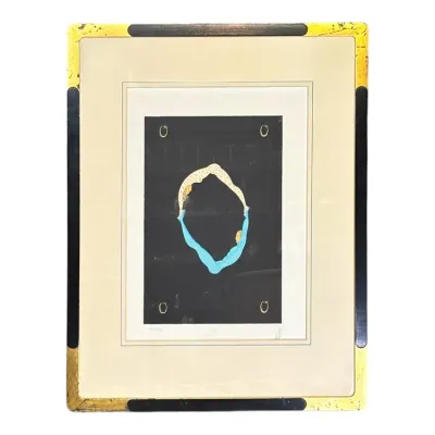 Sale Photo Thumbnail #83: Framed Art Deco limited edition serigraph print by Erté depicting the letter 'O' from the Alphabet series, featuring two figures forming an oval shape on a black ground.